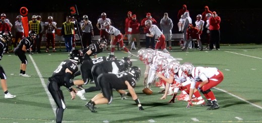 The defense waits for the snap at September 1st's varsity football game against Laconia. The Marauders won 16-7.