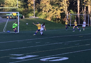 The girls varsity soccer team scores a goal against Kearsarge. The Marauders won with a 2-0 score. 